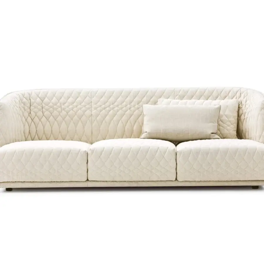 Distinguished Moroso Redondo sofa crafted in Italy with quilted light beige textile and balanced curves