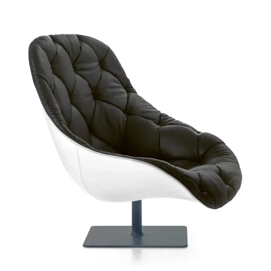 Lavish Moroso Bohemian lounge chair with black leather upholstery and white powder-coated steel swivel base