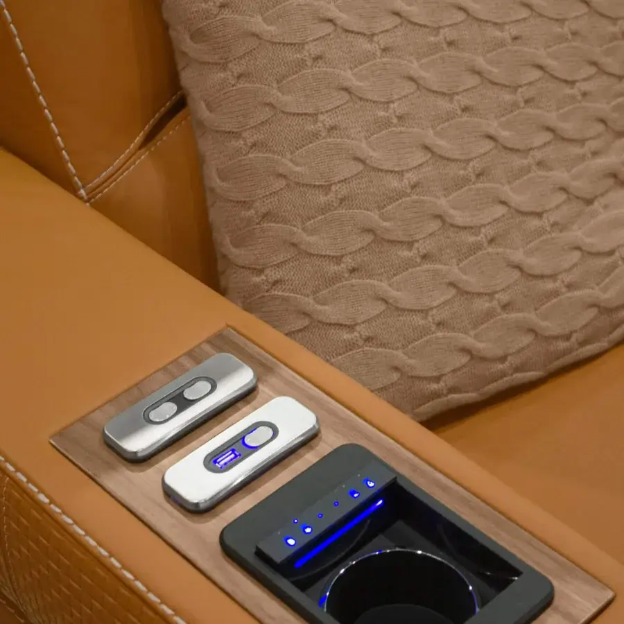 Distinguished Formitalia Dustin home cinema seating in tan upholstery with lacquered base and wood veneer armrests built with integrated controls