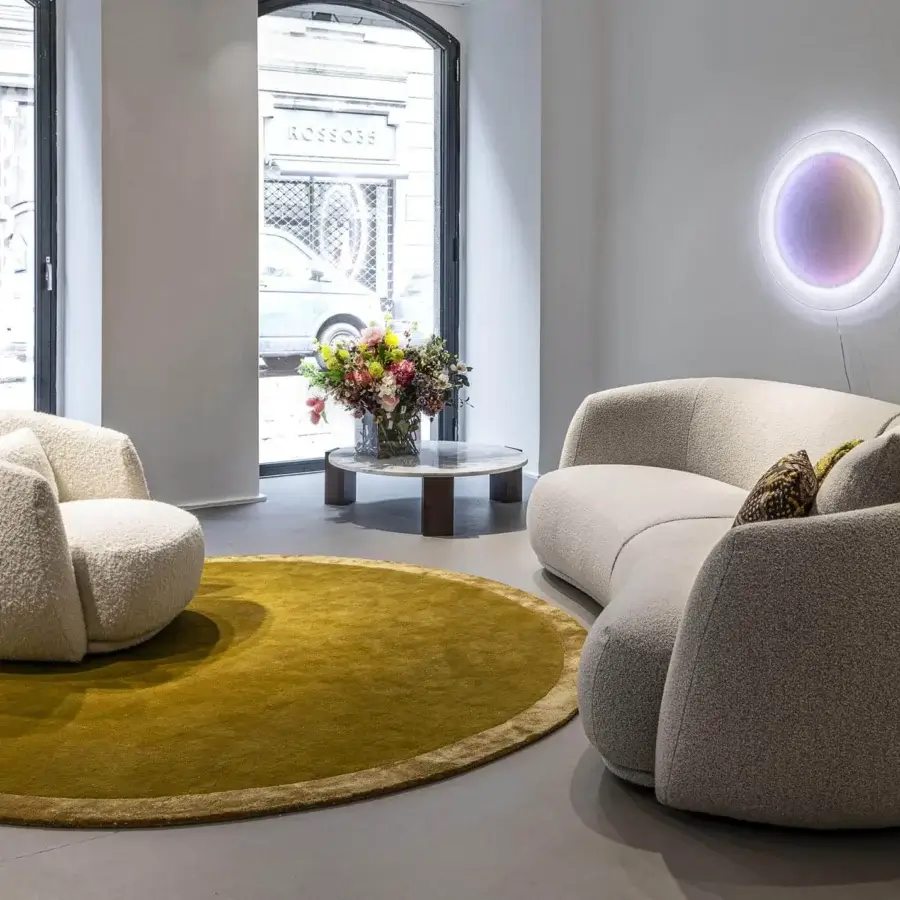 Lavish Moroso Sama rug crafted from wool and viscose with a deep gold color and subtly textured border