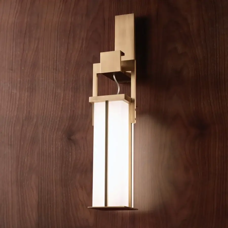 Elegant Bellavista Ignis wall lamp with slender white glass and matte brass, crafted in Italy