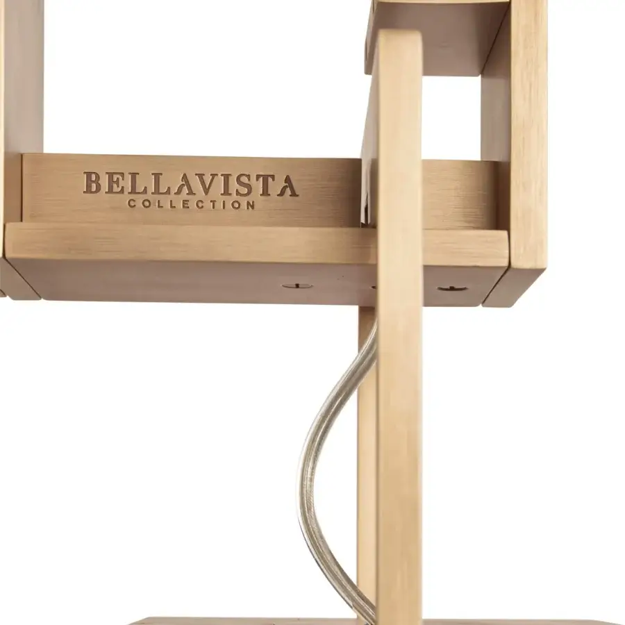 Exceptional Bellavista Ignis wall lamp with brass structure and white glass diffuser, illuminated by warm light with a silver flexible cable