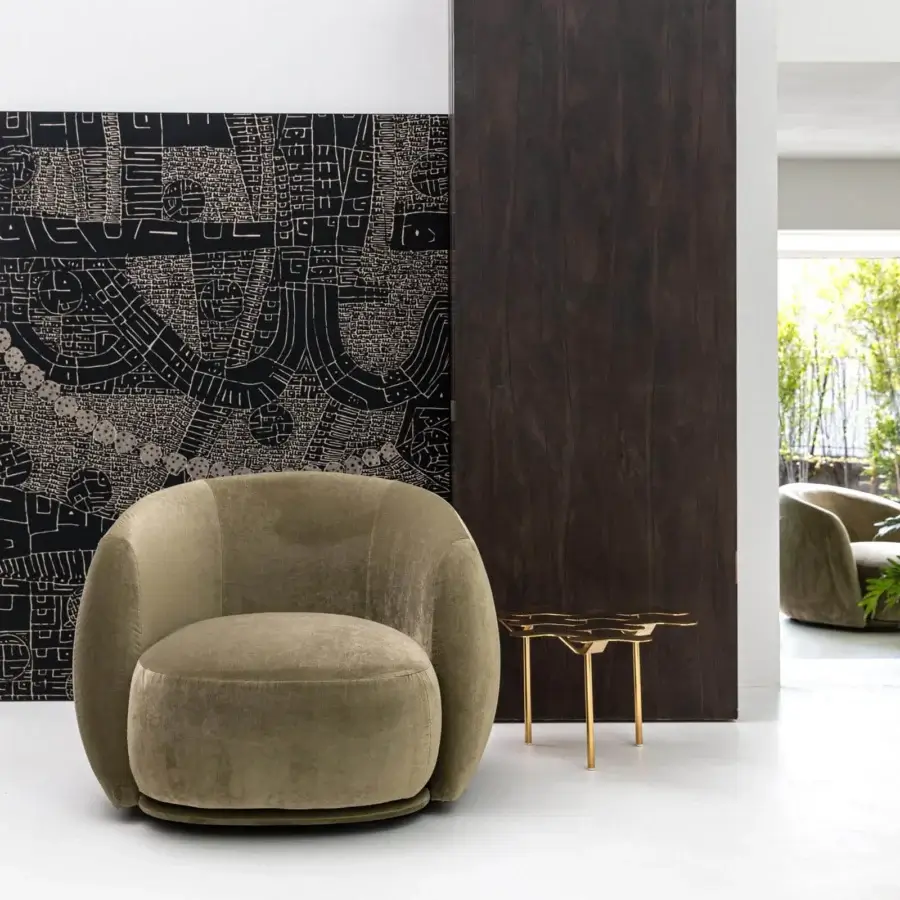 Exceptional Moroso Pacific lounge chair with rounded form upholstered in muted olive green textile and black polypropylene glides
