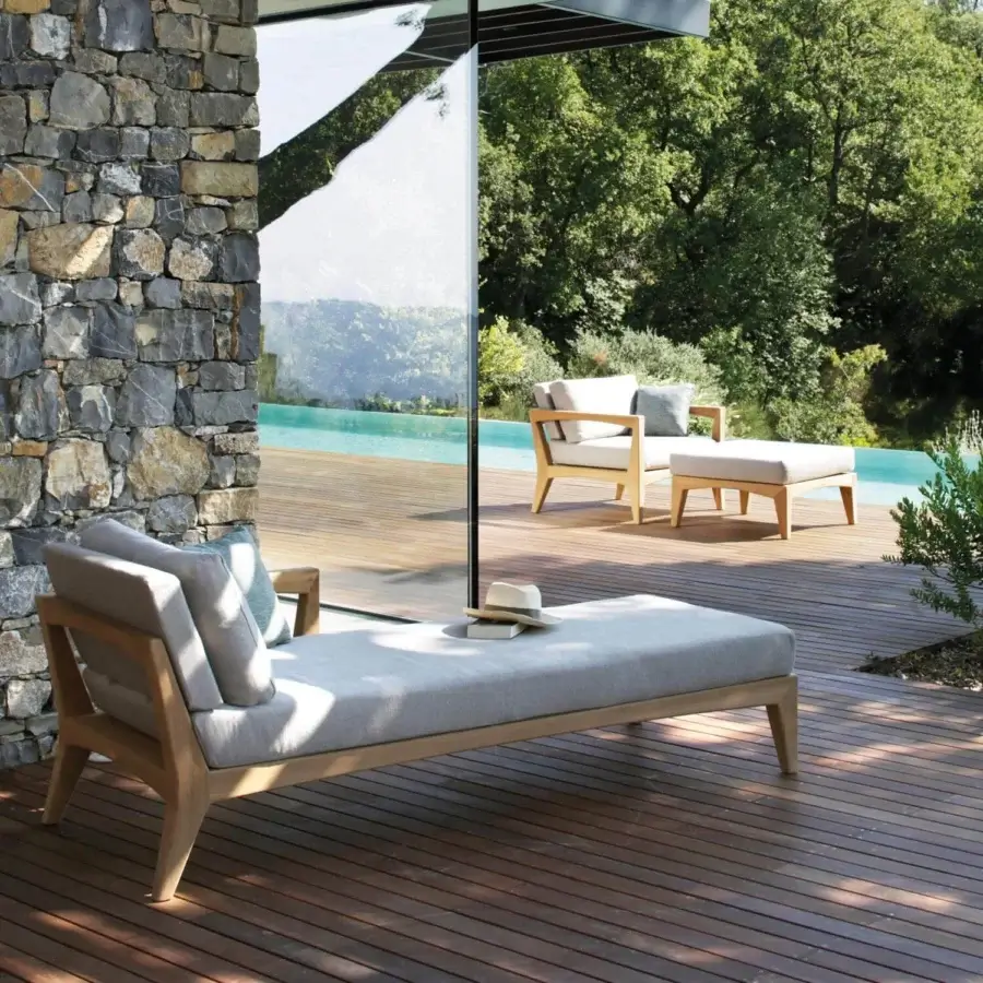 Exceptional Royal Botania Zenhit lounger crafted with teak wood and plush light gray fabric cushions for relaxing comfort