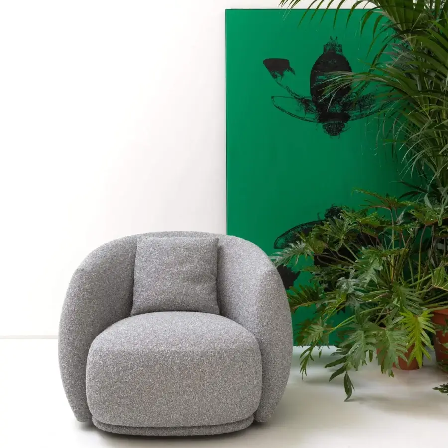 Exceptional Moroso Pacific lounge chair with enveloping rounded shapes upholstered in textured gray textile