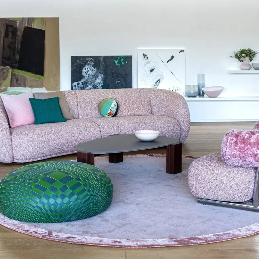 Exceptional Moroso Pacific sofa with enveloping form upholstered in textured speckled pink fabric and couture-inspired finishing