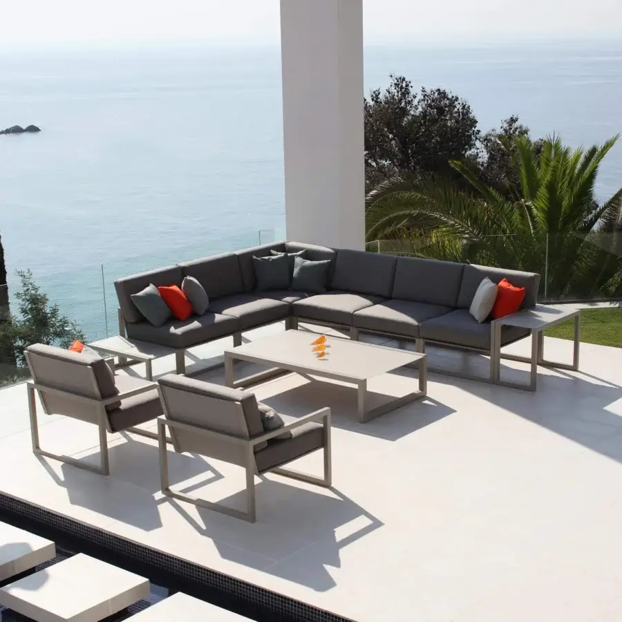 Elegant Royal Botania Ninix lounge chair with gray Batyline textile and matte steel frame crafted with optional teak wood armrests