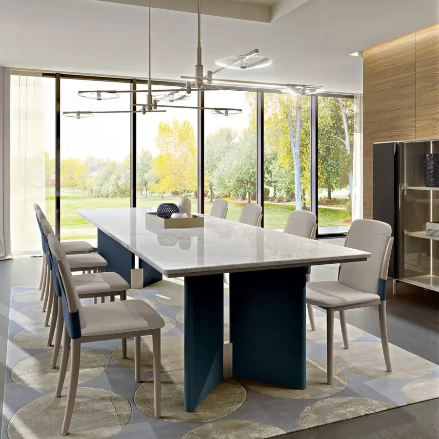 Superior Turri Zero suspension lamp with thin metal structure holding glass discs and intersecting tubular arms in a light finish