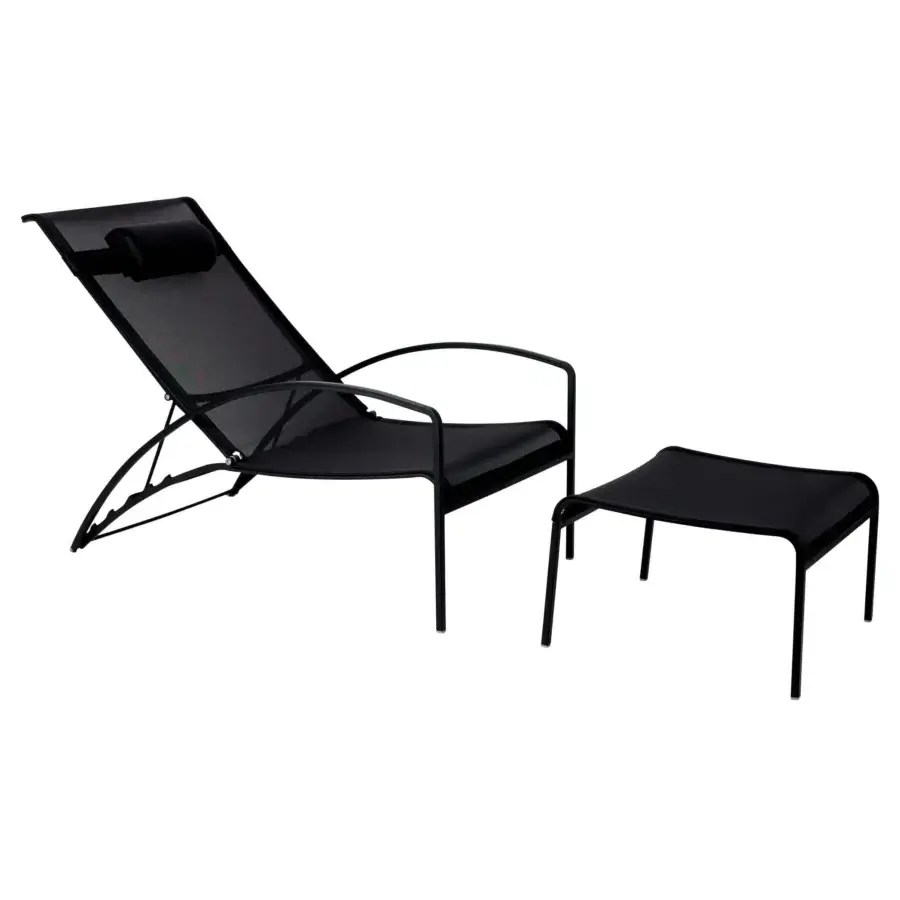 Exceptional Royal Botania QT lounger with black Batyline seat and brushed stainless steel frame built with a cylindrical head cushion
