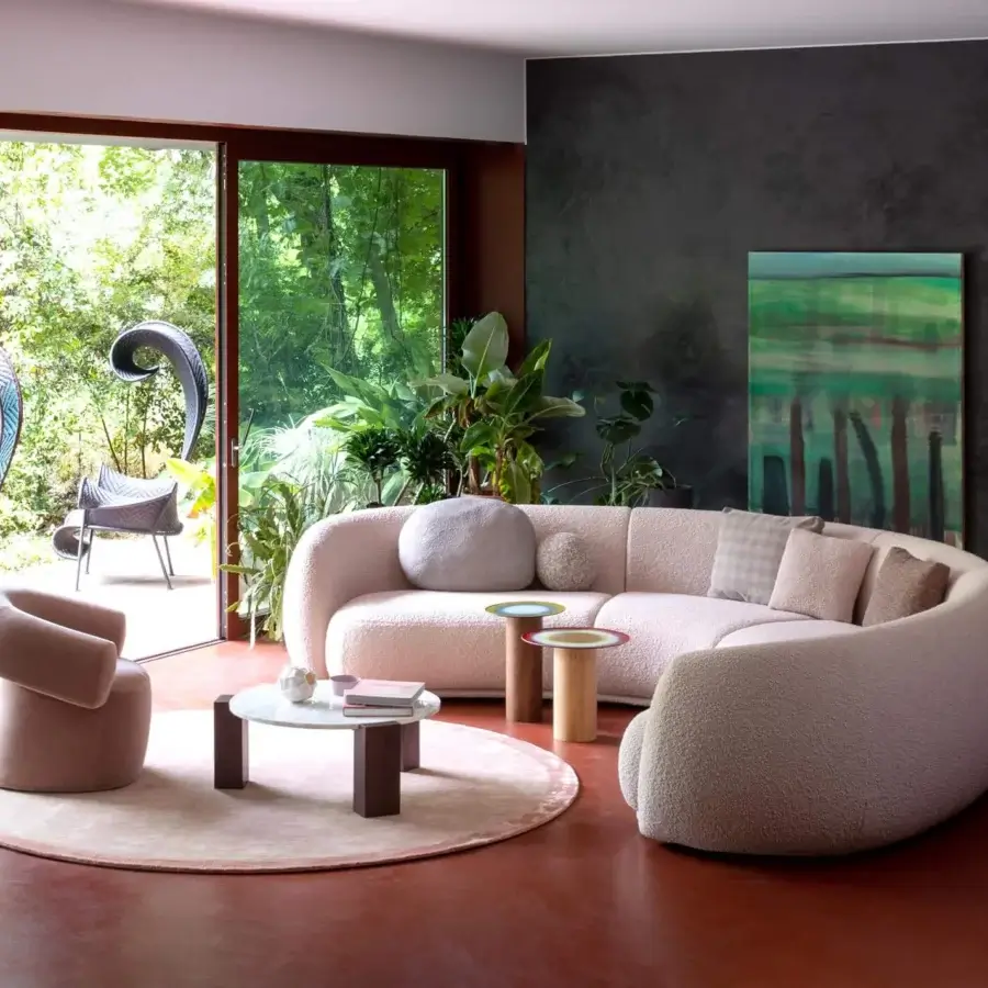 Superior Moroso Pacific sectional crafted in Italy with light pink textured textile and curved organic forms