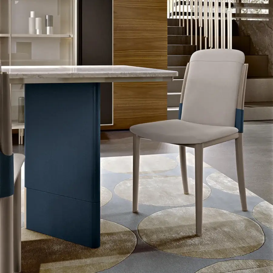 Captivating Turri Zero rug with circular patterns woven in varying shades of gray and beige wool and silk