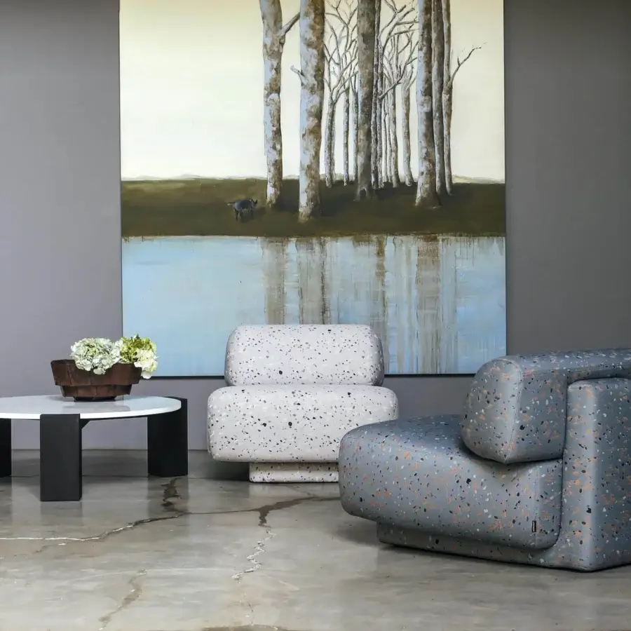 Distinguished Moroso Gogan lounge chair with speckled textile upholstery in gray and orange tones and black polypropylene glides