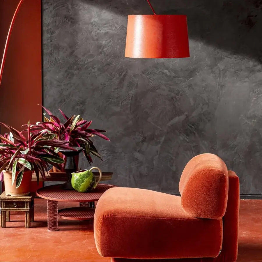 Sumptuous Moroso Gogan lounge chair with deep orange velvet-like textile upholstery and wooden structure