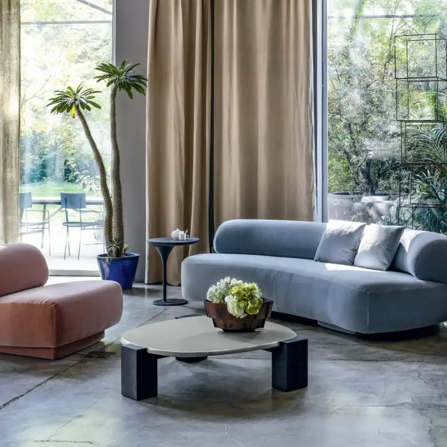 Exceptional Moroso Gogan lounge chair with salmon textile upholstery and smooth, curved wooden structure built with polyurethane foam