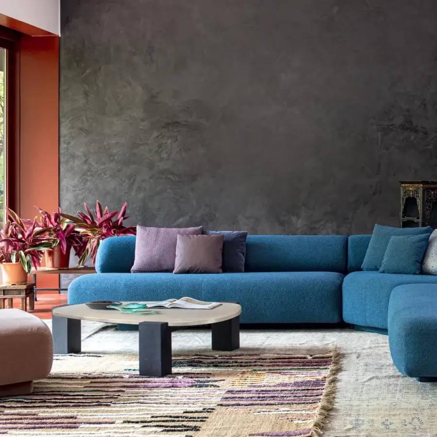 Distinguished Moroso Gogan lounge chair with light brown textile and rounded form built with differentiated density polyurethane foam