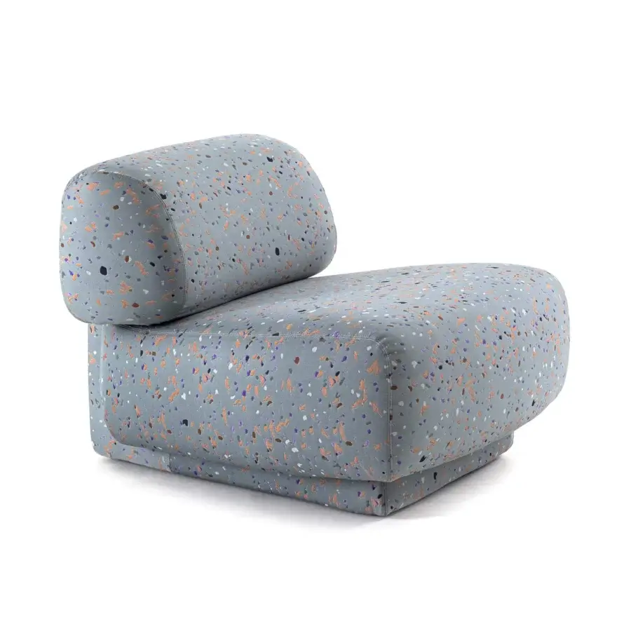 Refined Moroso Gogan lounge chair upholstered in light grey textile with speckled orange, brown, white, and purple tones and black polypropylene glides