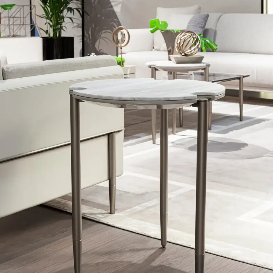 Elegant Turri Zero side table with gray marble top and dark gray metal legs in a smooth matte finish