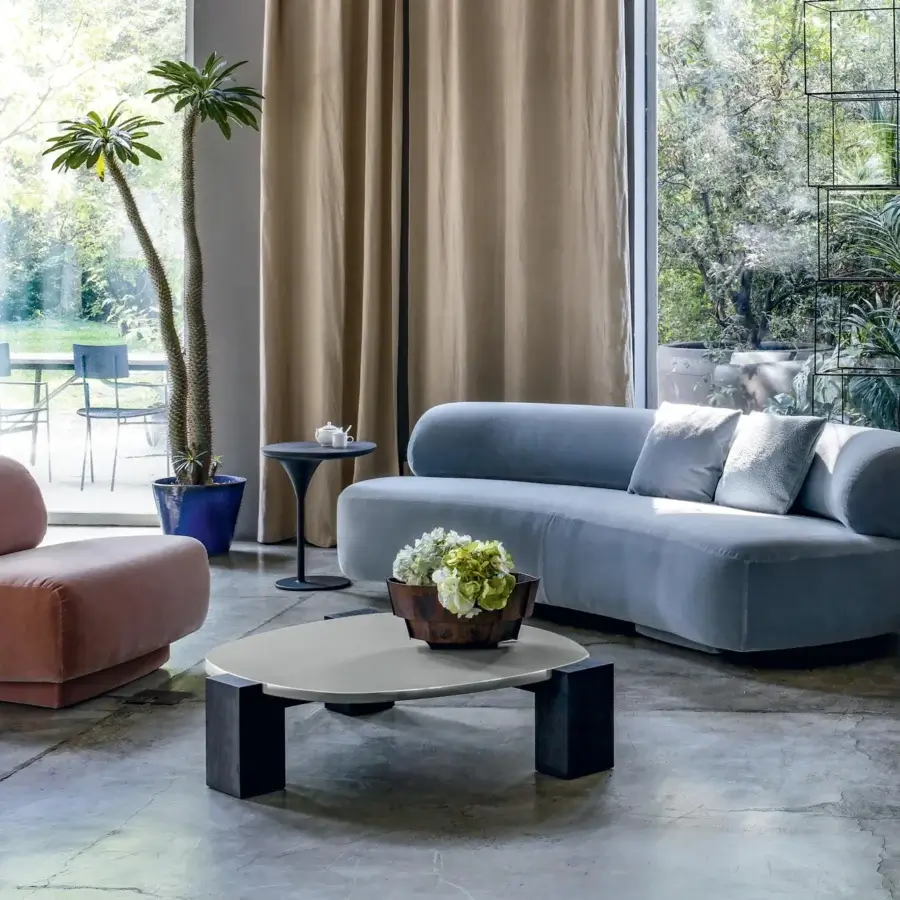 Distinguished Moroso Gogan sofa crafted with muted blue-grey textile and sculpted, irregular form built upon a wooden structure with polypropylene glides