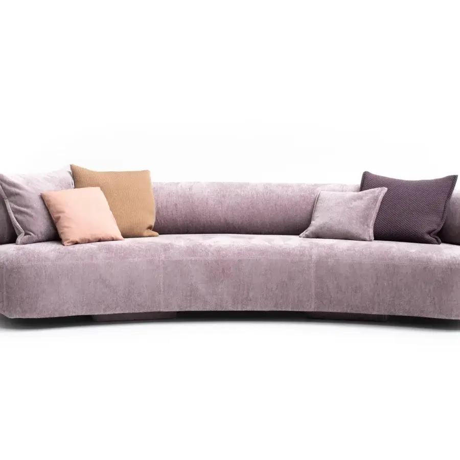 Innovative Moroso Gogan sofa sculpted like smooth stone with plush light purple textile and concealed polypropylene base