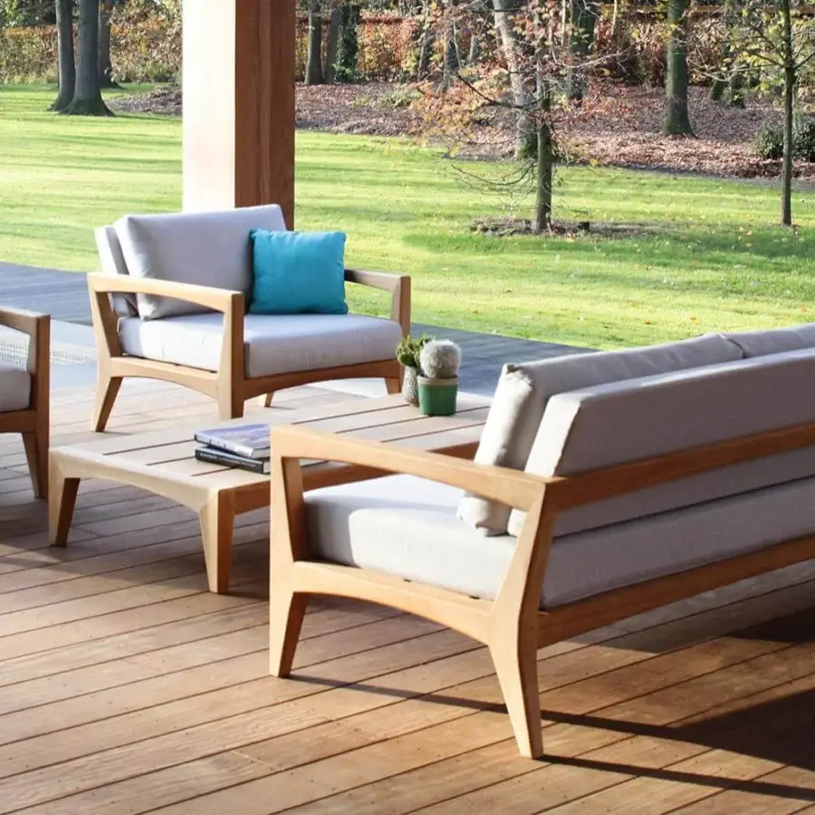 Distinguished Royal Botania Zenhit lounge chair crafted with teak wood and light gray cushions complemented by a turquoise accent