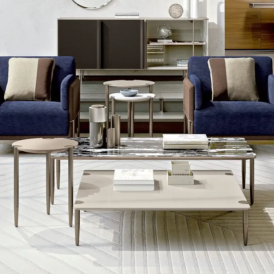 Exceptional Turri Zero coffee table with overlapping wooden tops and visible metal structure in light beige composite with marbled finish