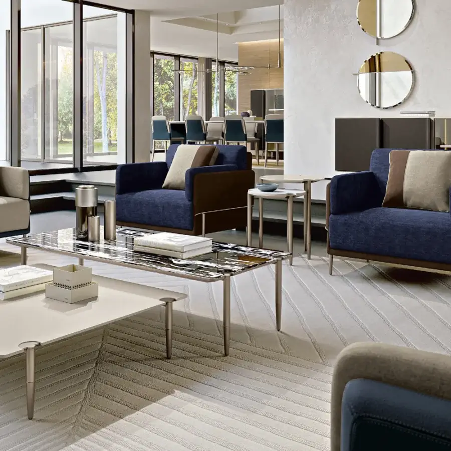 Superior Turri Zero coffee table with overlapping wooden tops and slender metal legs in lacquered finish