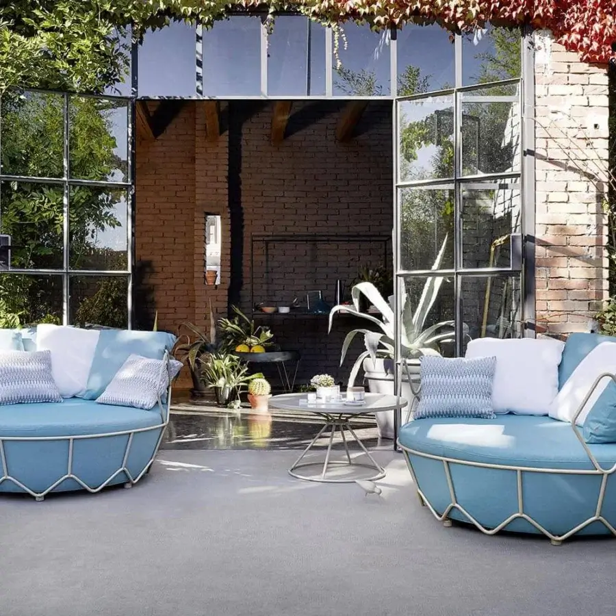 Exceptional Roberti rattan coffee table with a light powder-coated aluminum top and interconnected stainless steel base