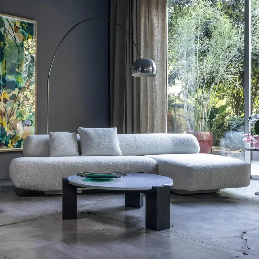 Superior Moroso Gogan sectional upholstered in light neutral textile with a wooden structure and removable cover