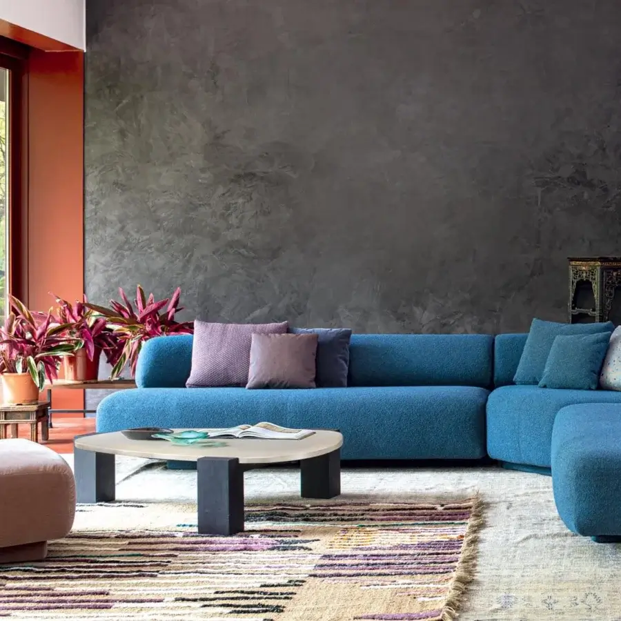 Distinguished Moroso Gogan sectional with organic form upholstered in textured blue fabric and wooden structure