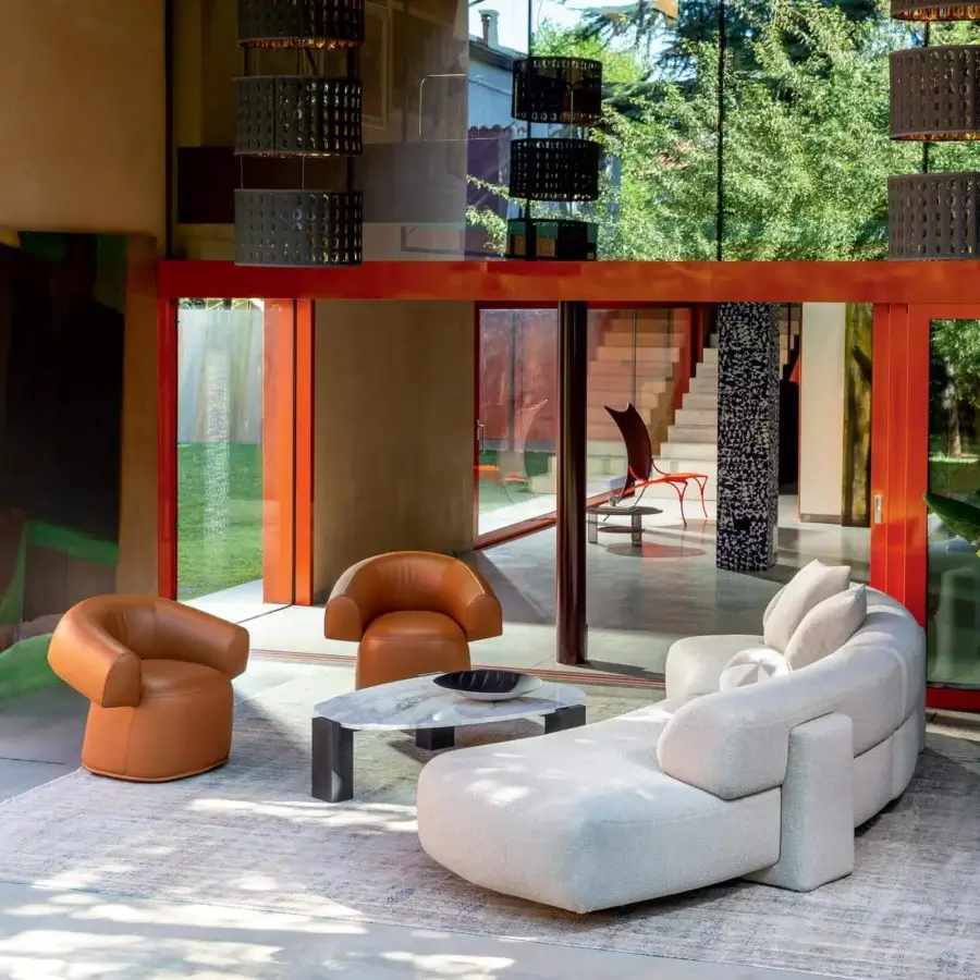 Superior Moroso Gogan sectional upholstered in light cream woven fabric with a wooden structure and black glides