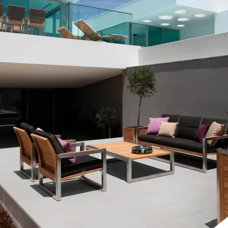 Distinguished Royal Botania Ninix coffee table crafted with teak wood and a sleek stainless steel frame