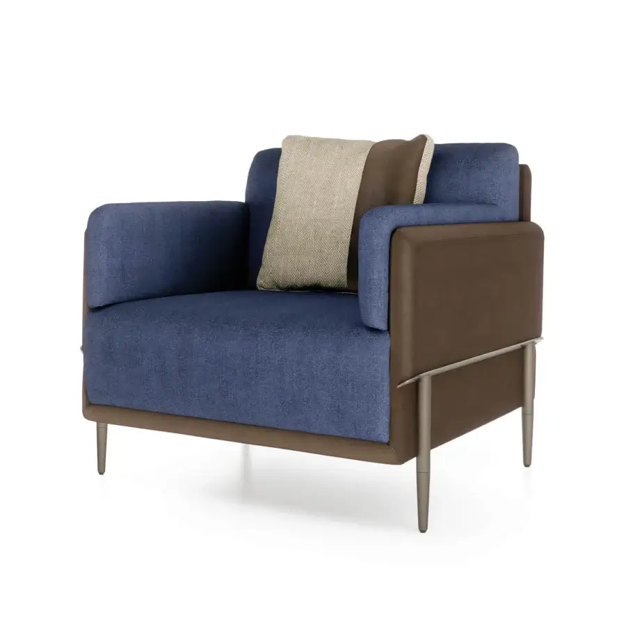 Exceptional Turri Zero lounge chair with textured blue fabric and smooth brown leather shell in platinum finish