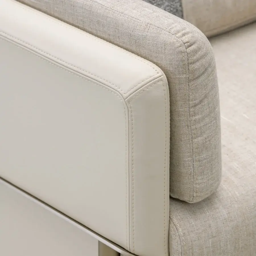 Superior Turri Zero lounge chair with platinum metal, off-white leather and light beige fabric cushions crafted in Italy