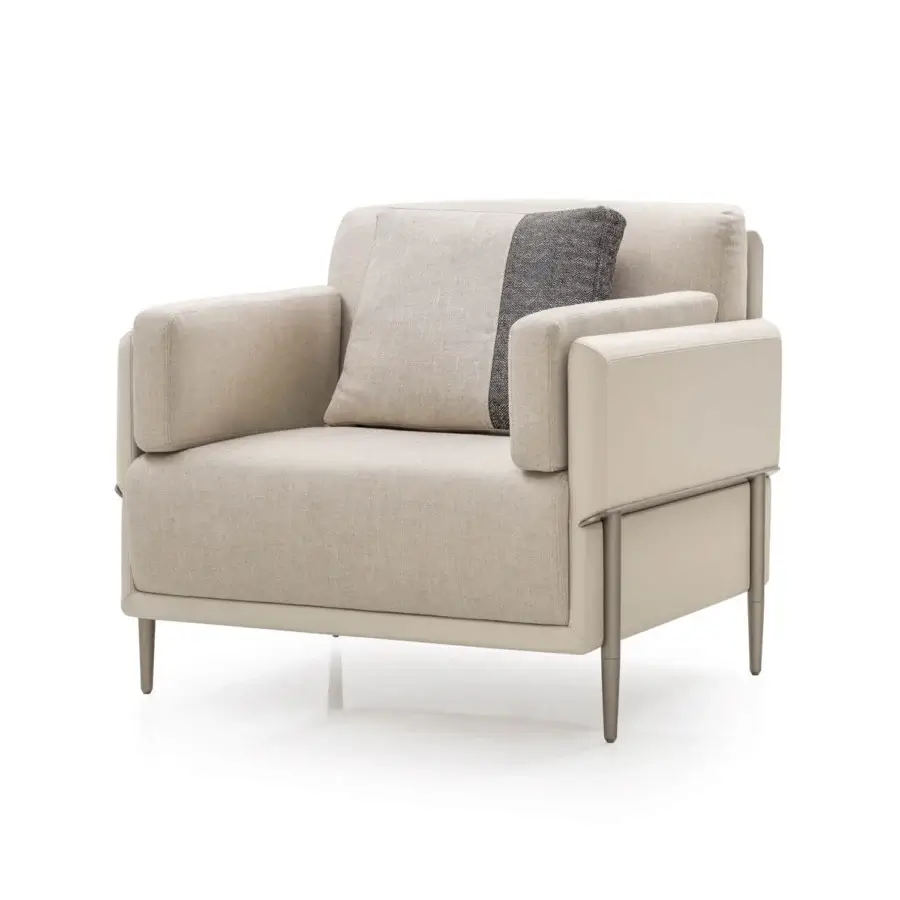 Distinguished Turri Zero lounge chair with light beige fabric cushions and a satin platinum metal structure
