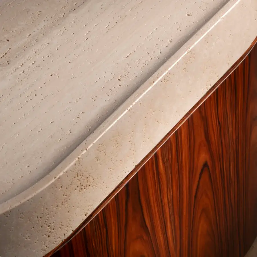 Distinguished Bellavista Osvaldo side table with a porous beige marble top and glossy dark brown curved Italian poplar wood base