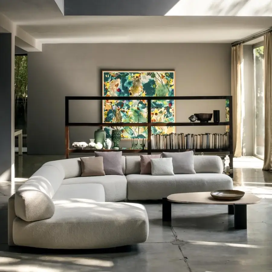 Exclusive Moroso Gogan coffee table with organic shapes and dark wood legs in a light-colored matte finish
