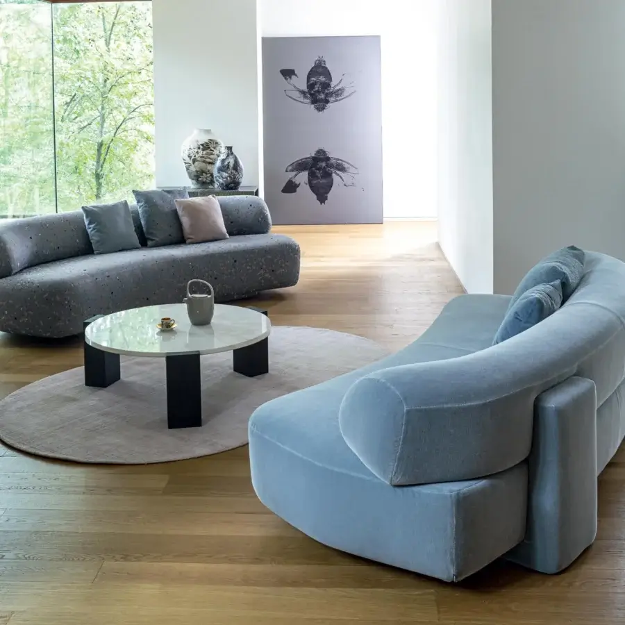 Refined Moroso Gogan coffee table built with polished white marble and dark wood legs in a modern minimalist style