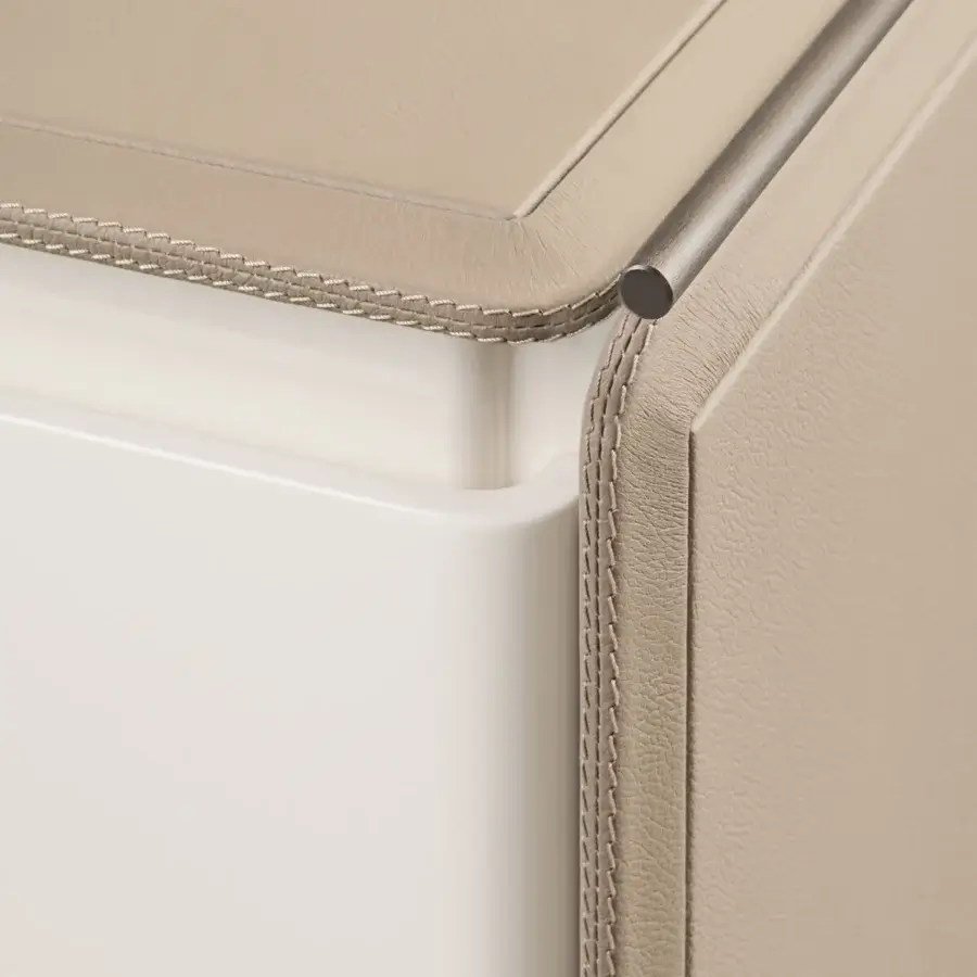 Exclusive Turri Zero nightstand in beige leather with a glossy lacquered shelf and off-white drawer featuring a cylindrical metal handle