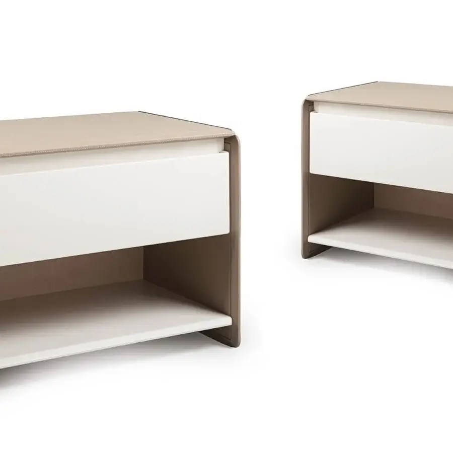 Elegant Turri Zero nightstand in light beige faux leather with a glossy lacquered white drawer and shelf