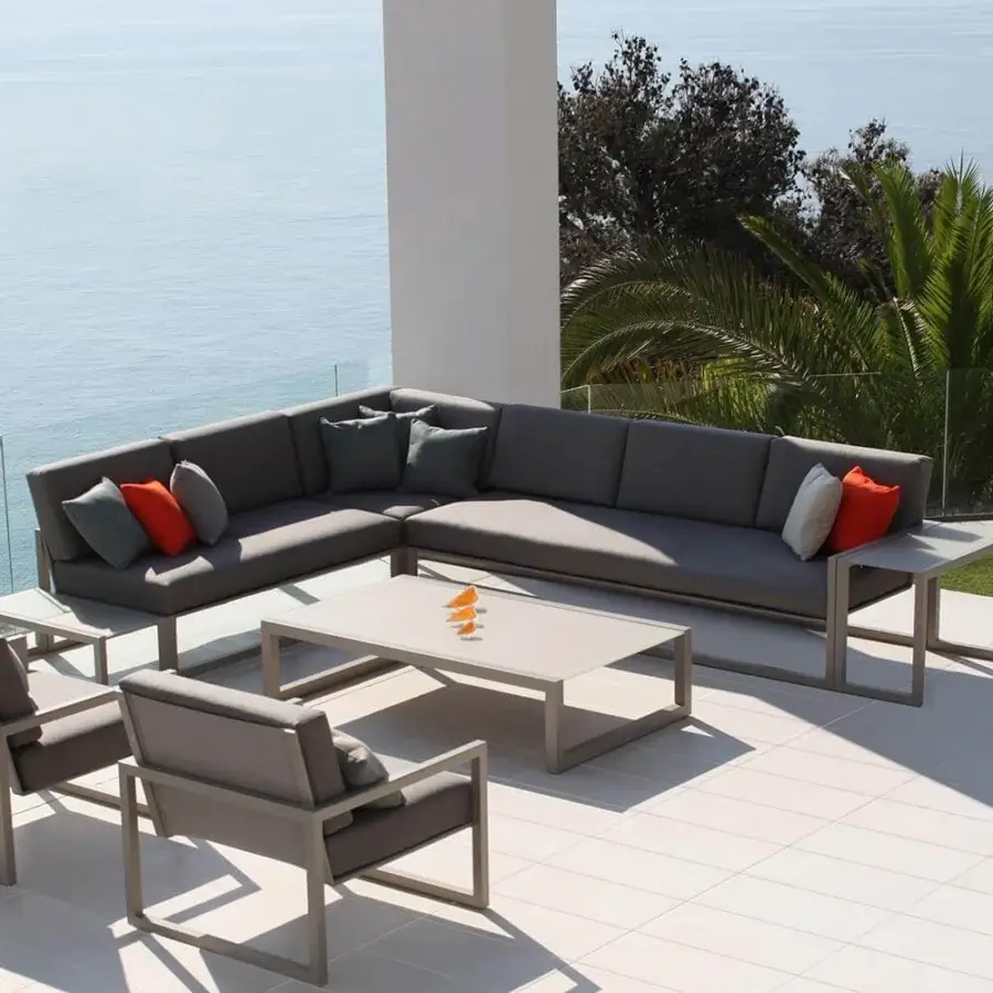 Exceptional Royal Botania Ninix lounge sectional with stainless steel frame and comfortable Batyline seat in shades of grey and orange