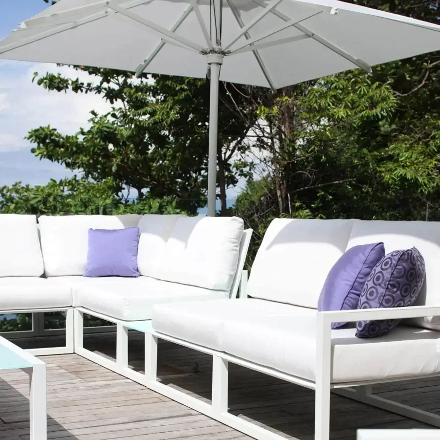 Distinguished Royal Botania Ninix lounge sectional with stainless steel frame and Batyline seat in crisp white cushions