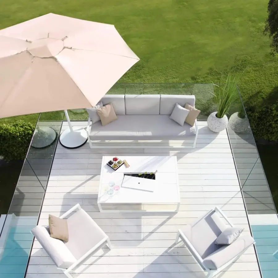 Elegant Royal Botania Ninix lounge sofa with linear matte white stainless steel frame and light gray Batyline cushions
