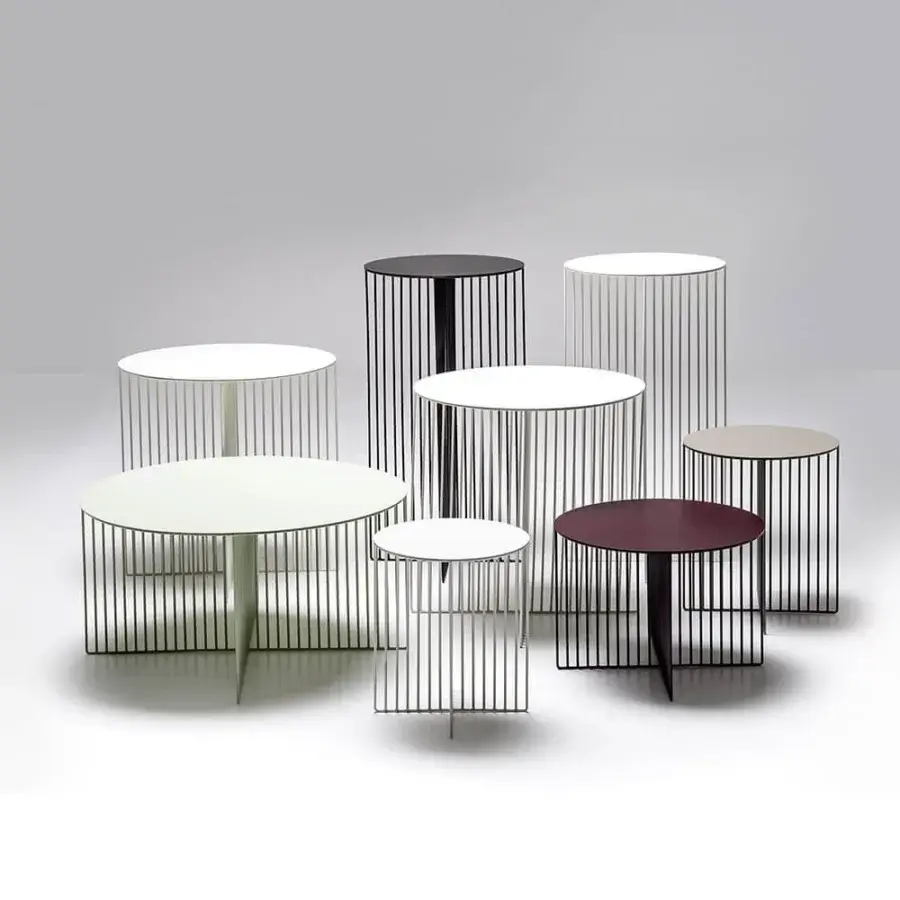 Exceptional LaCividina Accursio side table with a cross-shaped tubular steel base and pale green round tabletop in matte finish