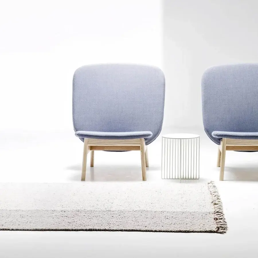 Distinguished LaCividina Accursio side table crafted with a cross-shaped tubular steel base and glossy white circular top