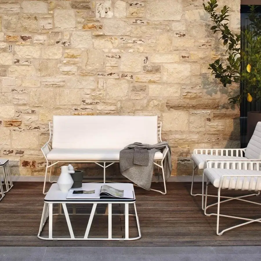 Exceptional Roberti Rattan Hamptons Graphics coffee table with powder coated aluminum base and lacquered glass top in matte white