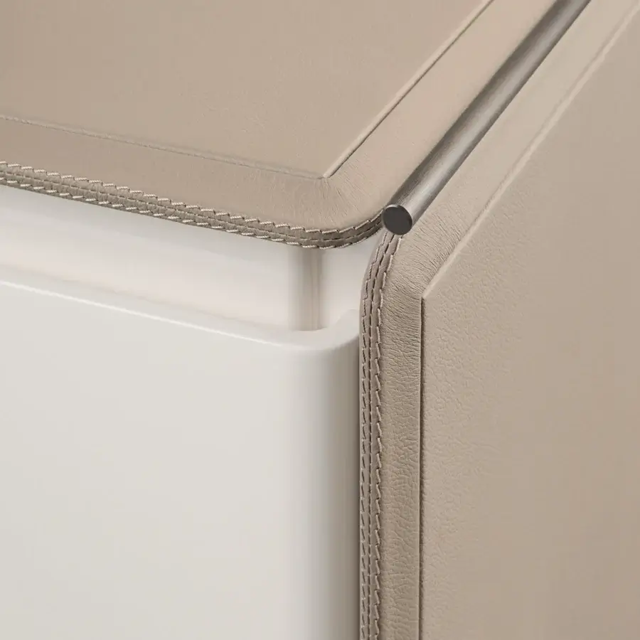 Meticulous Turri Zero vanity crafted in light beige Italian leather with a glossy white lacquered drawer and slender metal handle