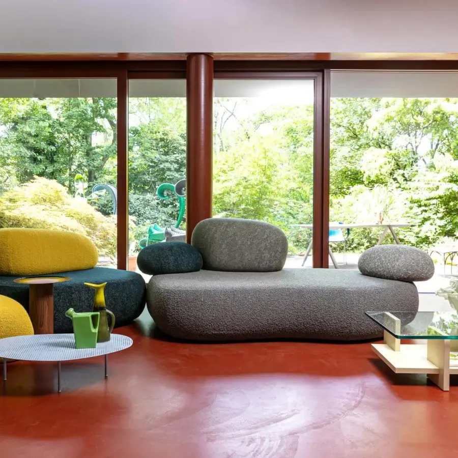 Exceptional Moroso Pebble Rubble lounge chair with organic curves upholstered in textured gray textile crafted in Italy