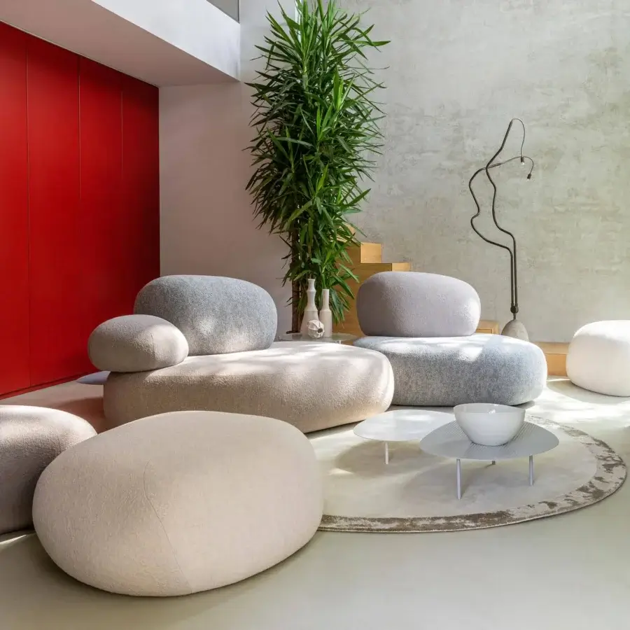 Lavish Moroso Pebble Rubble lounge chair with organically shaped modules upholstered in textured neutral fabric