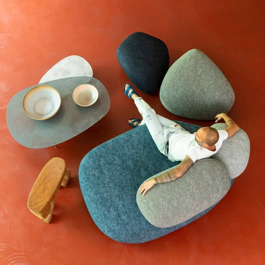Distinguished Moroso Pebble Rubble lounge chair crafted from polyurethane foam with matte textile upholstery in blue, gray, and charcoal shades