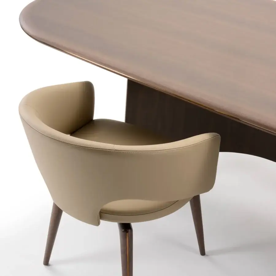 Distinguished Turri Blues table with walnut wood top, wings-inspired base and delicate metal detail in a smooth finish